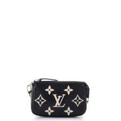 Pochette Accessoires Bicolor Monogram Empreinte Giant Mini