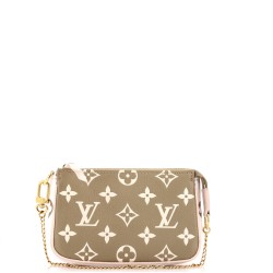 Pochette Accessoires Spring in the City Monogram Empreinte Leather Mini