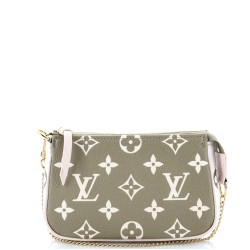 Pochette Accessoires Spring in the City Monogram Empreinte Leather Mini