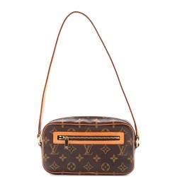 Cite Pochette Monogram Canvas